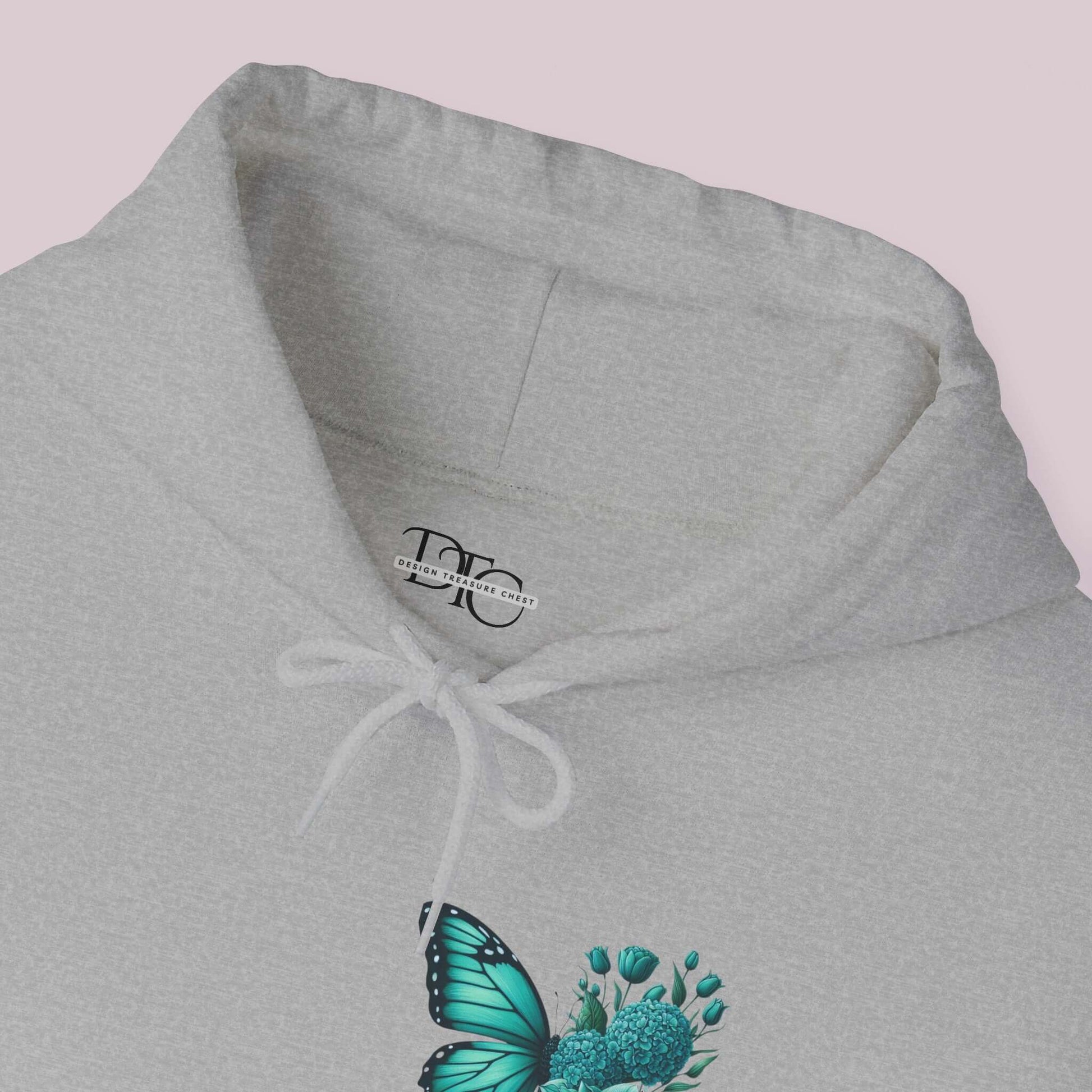 "Wings Of Hope Butterfly and Flowers Hoodie in High-Quality Fabric, Close View of Butterfly and Flowers Design"