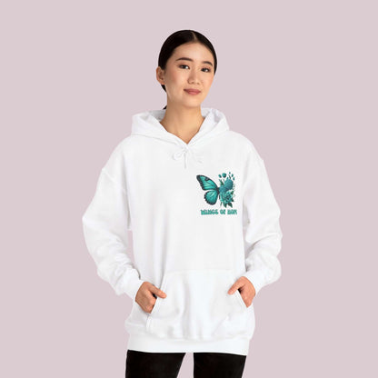 Woman wearing "Wings Of Hope" Butterfly and Flowers Hoodie in white for comfort and style.