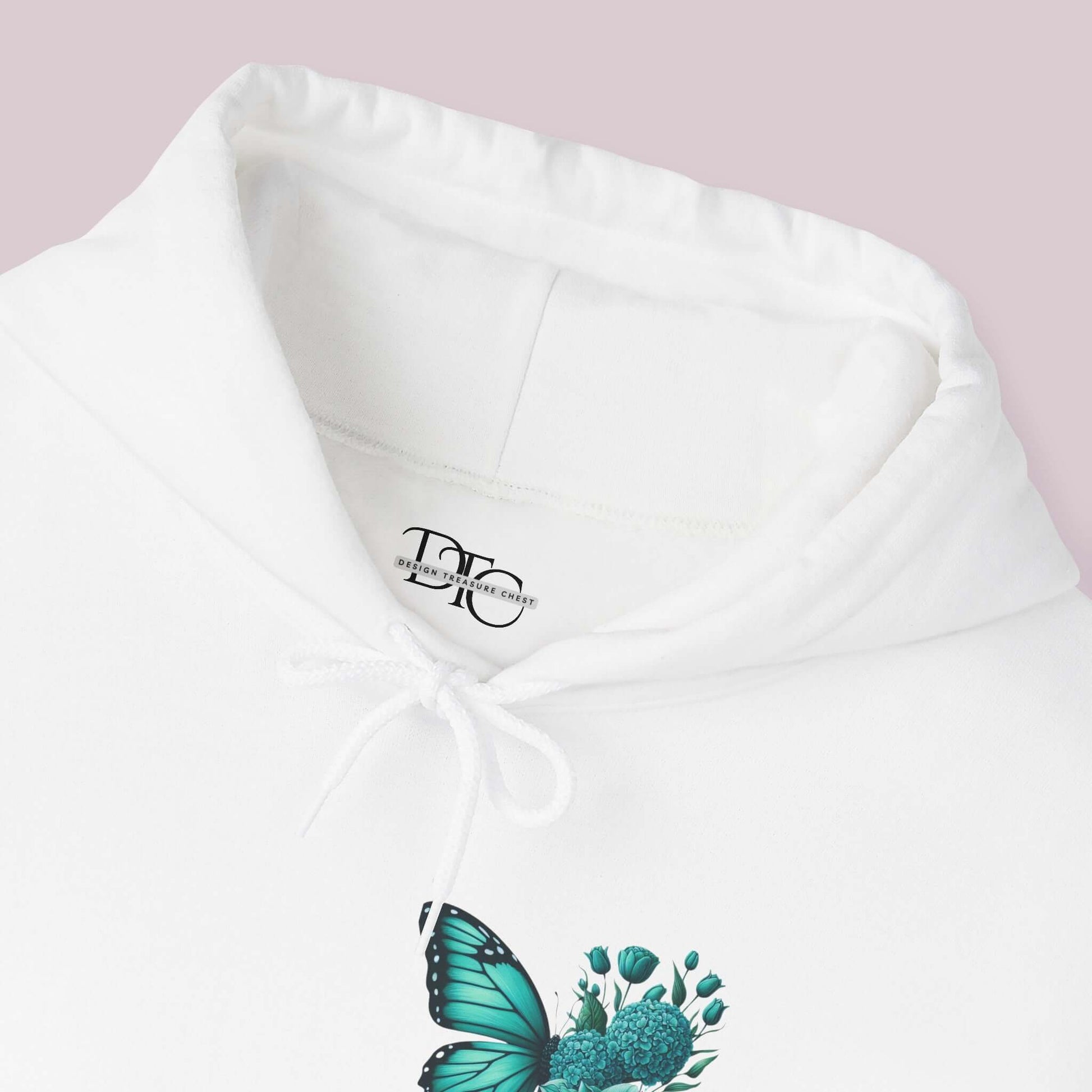 "Wings Of Hope Butterfly and Flowers Hoodie with teal butterfly and flower design on soft white fabric"